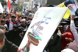 محافظ شخصی حسن نصرالله بادیگارد روحانی شد؟/ عکس