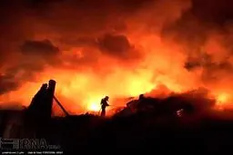 تصاویری از آتش سوزی در انبار بعثت تهران