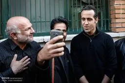 آقای دوربینی در کنار علی کریمی/عکس