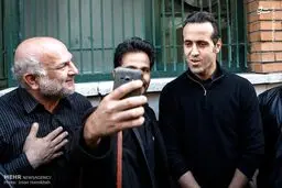 آقای دوربینی در کنار علی کریمی/عکس