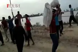 فیلم/ یزله و شعرخوانی جوانان خوزستانی برای مقابله با سیلاب