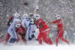 فوتبال آمریکایی در آب و هوایی عجیب/تصاویر