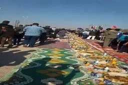 برپايي طولاني ترين سفره جهان براي زائران اربعين حسيني/ عکس