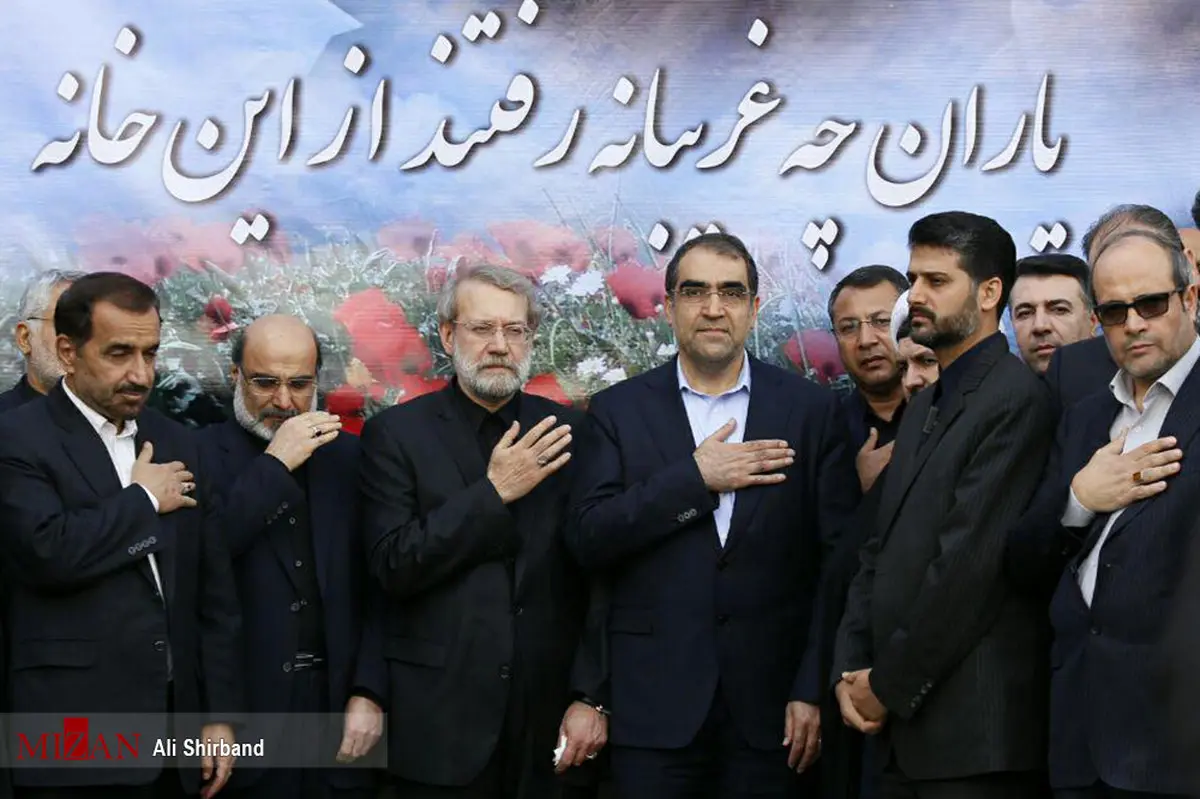 لاریجانی و وزیر بهداشت در تشییع پیکر شهید خرایی/عکس