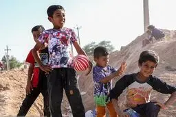 تصاویر: کودکان سیل‌زده «حمیدیه»