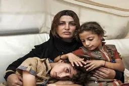 عکس دردناک یک مادر آواره عراقی