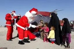 بابانوئل میان کودکان جنگ‌زده عراق/تصاویر