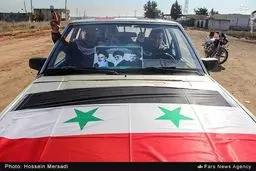 تصویر امام خمینی و رهبر انقلاب بر خودروی رزمندگان سوری/عکس