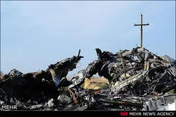 تصاویر بقایای هواپیمای ساقط شده مالزی در اوکراین