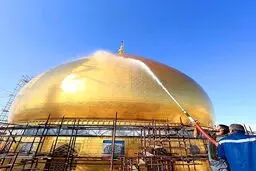 شستشوی گنبد حرم امامین عسگریین/عکس